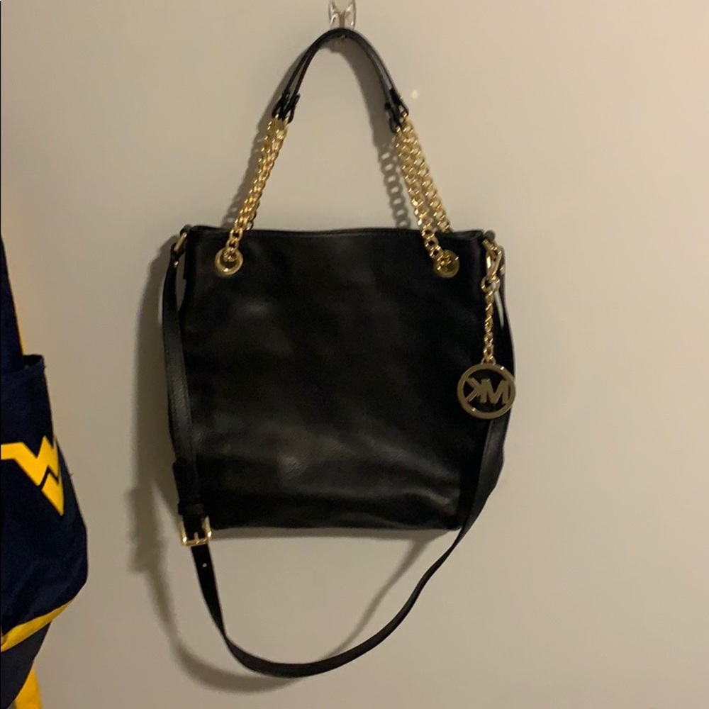 Black and gold Michael Kors purse